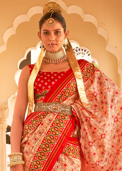 Add a Touch of Grace and Elegance to Your Wardrobe with the Apricot Pink Printed Patola Tussar Silk Saree