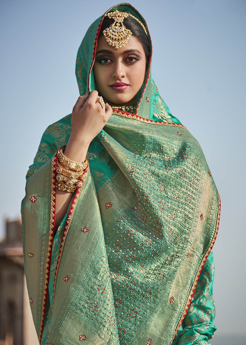 Elegant and Timeless Green Woven Banarasi Silk Saree with Embroidered Blouse