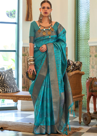 Unleash Your Inner Glamour with the Teal Blue Organza Saree