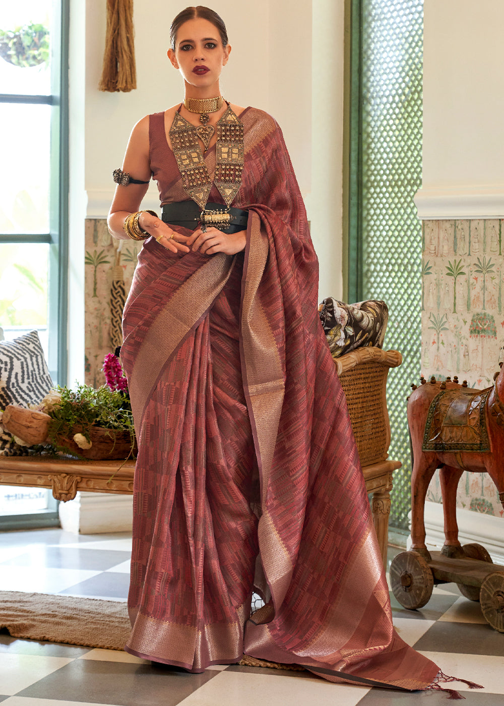 Step into a World of Grace and Elegance with the Plum Violet Organza Saree