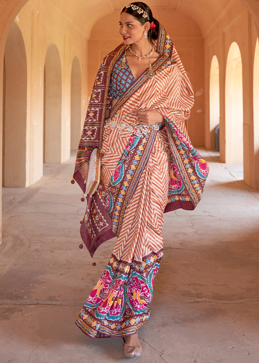 Earthen Elegance: Shades of Brown Printed Patola Silk Saree with Zari Border