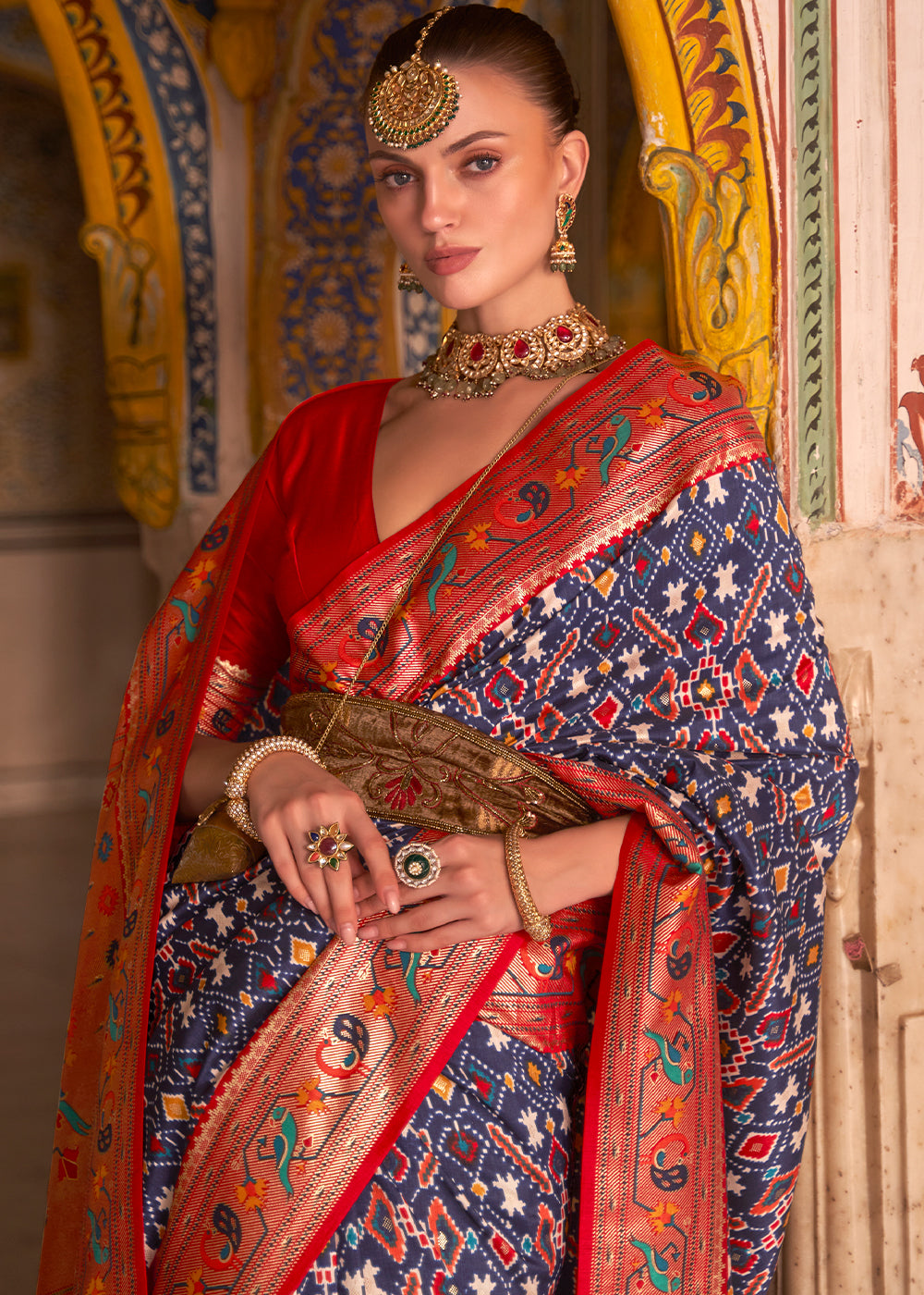 Bold Blue and Red Patola Silk Saree - A Stunning Fusion of Colors