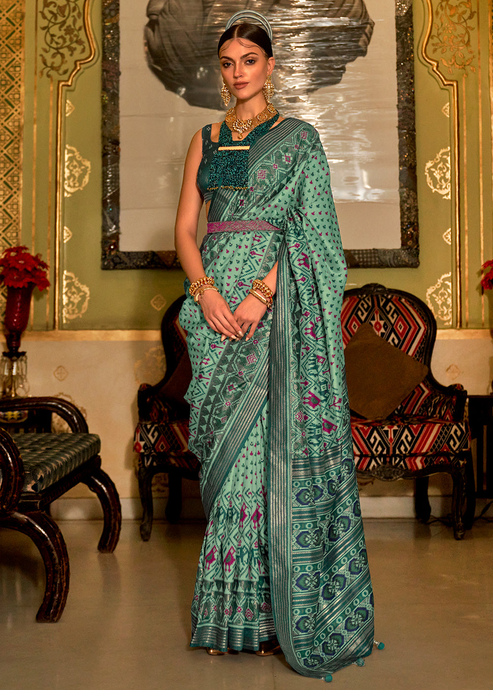 Radiant Green Woven Patola Silk Saree for a Striking Statement
