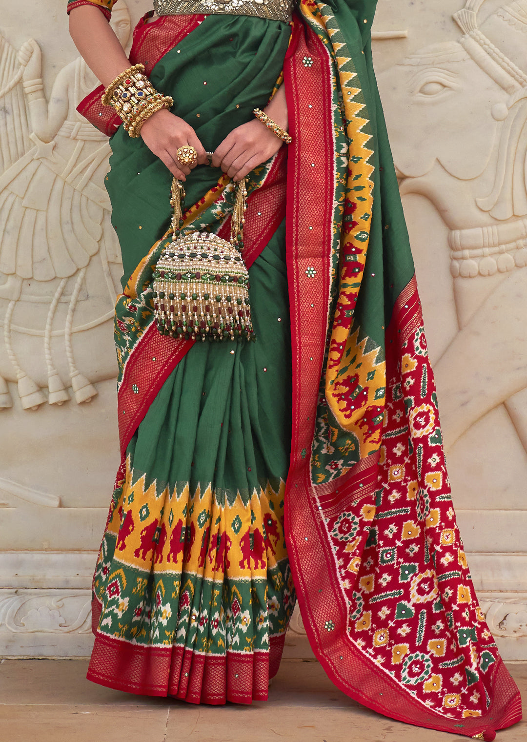 Channel Nature's Beauty with the Juniper Green Woven Patola Silk Saree
