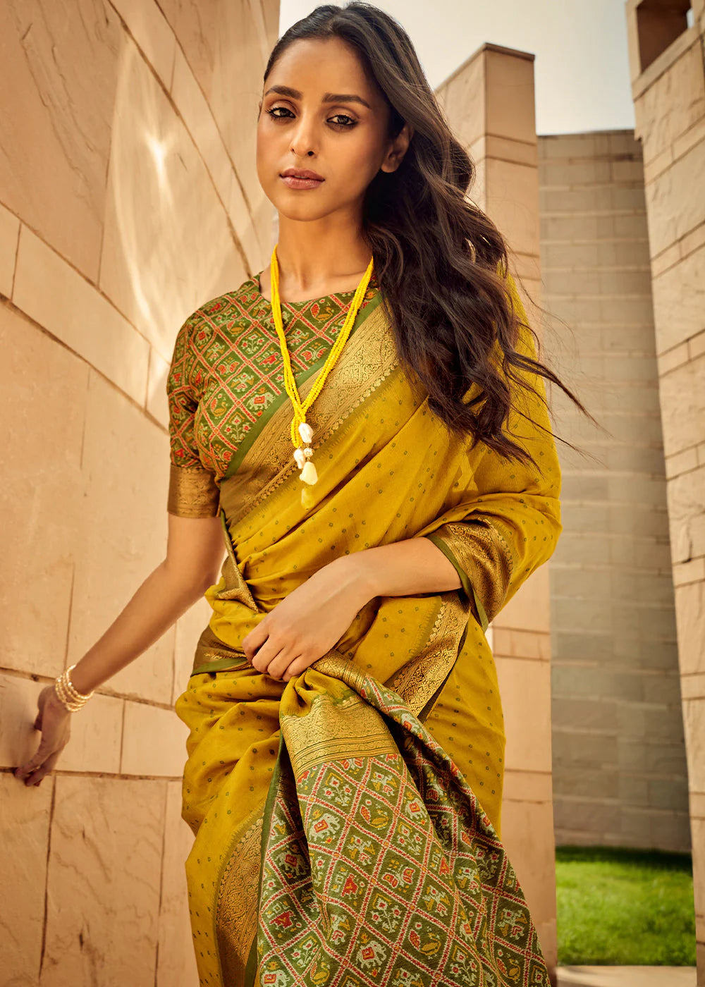 MUSTARD YELLOW WOVEN PATOLA SILK SAREE