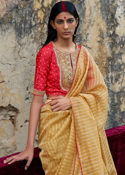 Aureolin Yellow ZARI WEAVING ORGANZA SAREE WITH EMBROIDERED BLOUSE