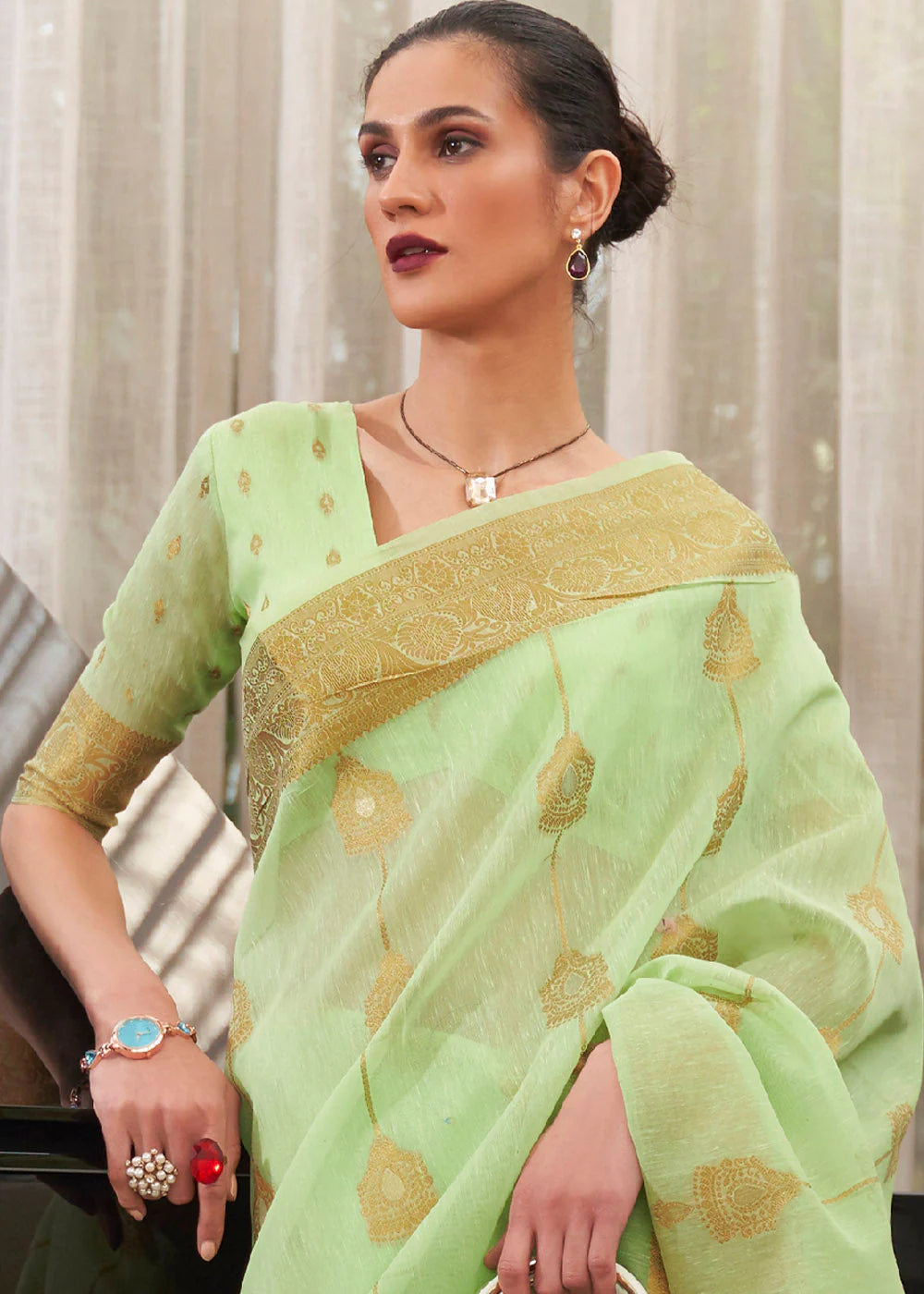 GREEN COPPER ZARI WOVEN LINEN SILK SAREE