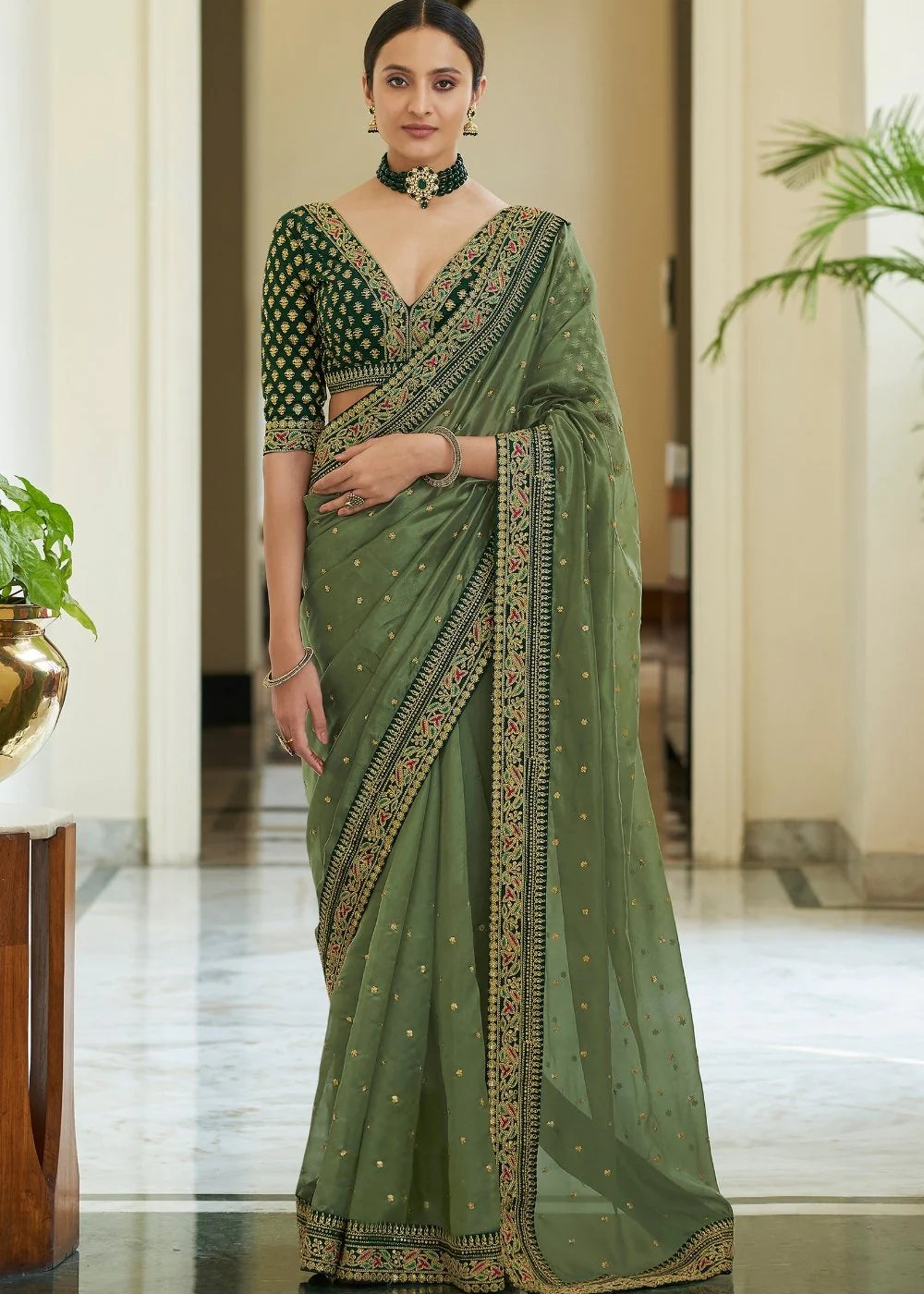 Radiant Olive Green Organza Saree with Dori, Sequins, and Zari Work