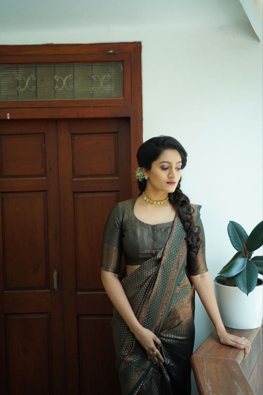 STUNNING DARK GREEN COLOUR SAREE WEAVED WITH COPPER ZARI