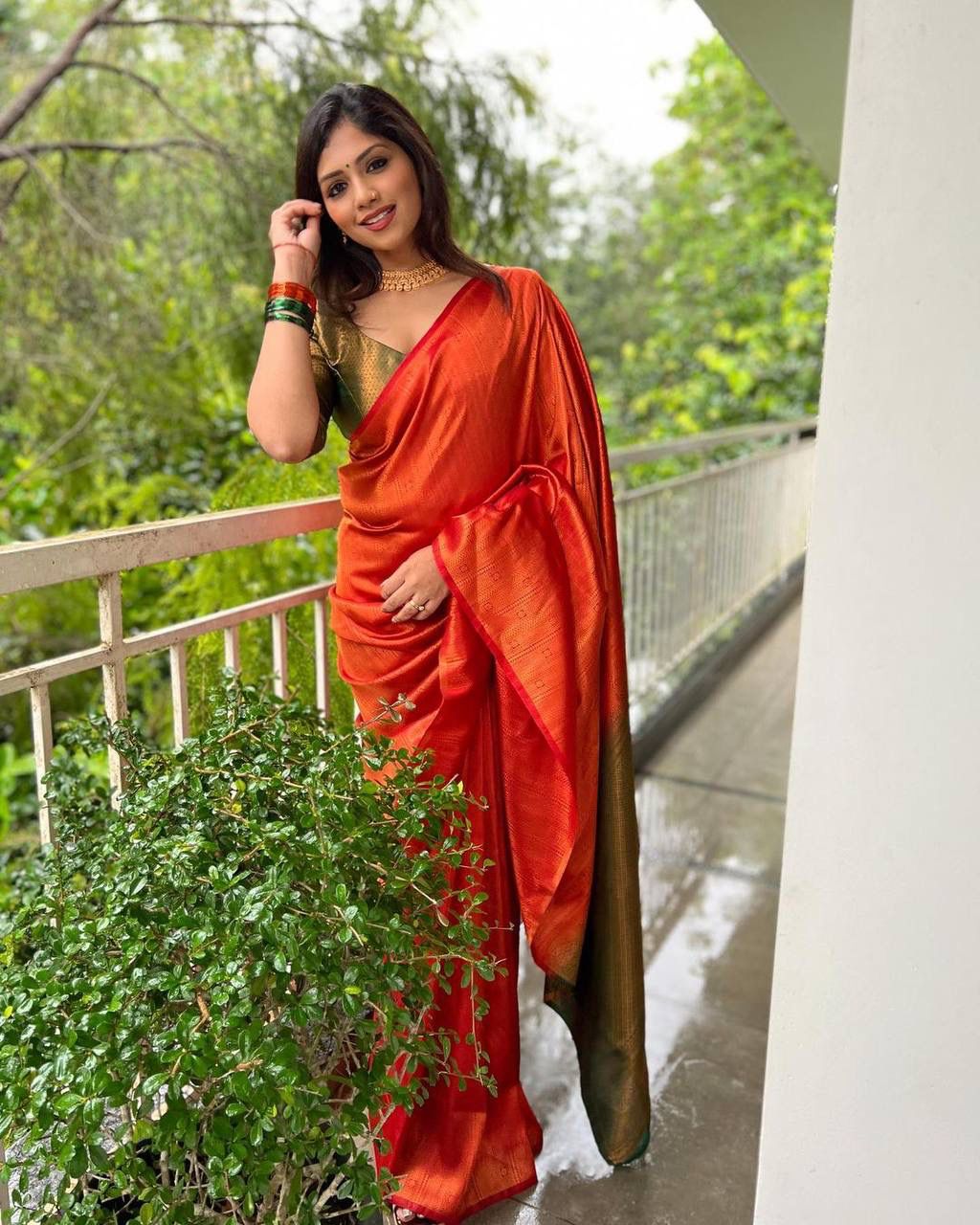 STUNNING ORANGE SAREE WITH DARK GREEN BORDER AND BLOUSE