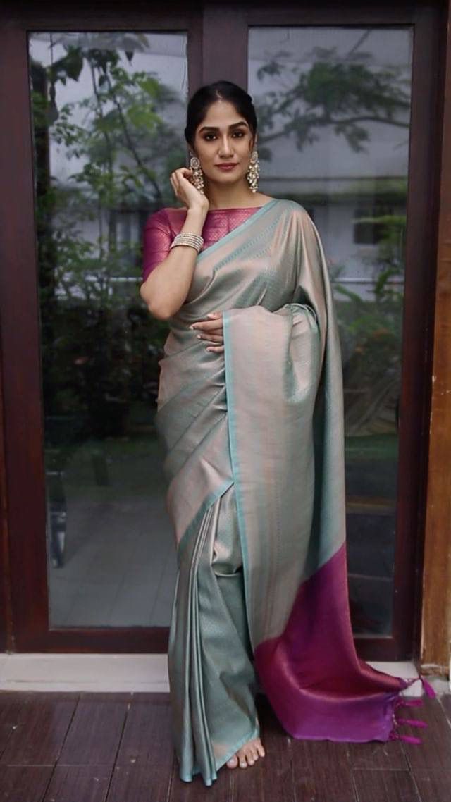 LIGHT FIROZI SAREE WITH HEAVY MAGENTA BROCADE BLOUSE