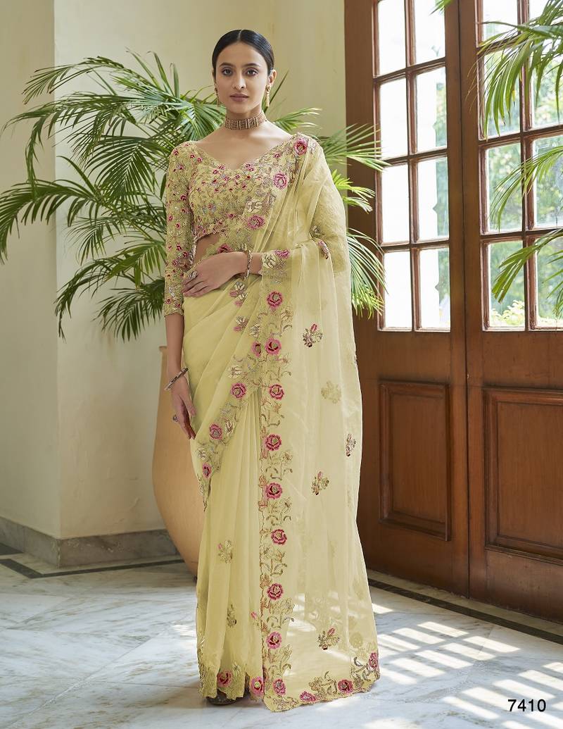 LIME YELLOW ORGANZA SAREE WITH DORI, SEQUINS, & CUT-WORK