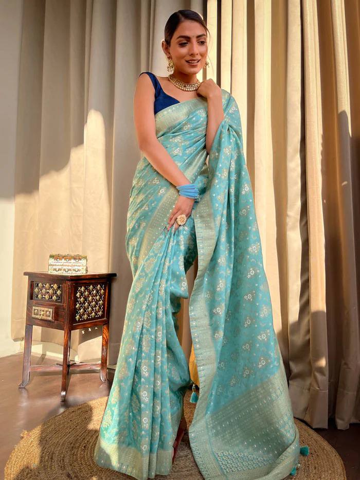 TURQUOISE GREEN SAREE WITH HEAVY BROCADE BLOUSE