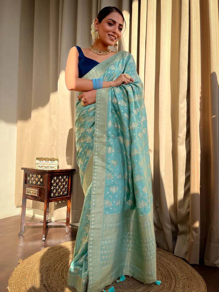 TURQUOISE GREEN SAREE WITH HEAVY BROCADE BLOUSE