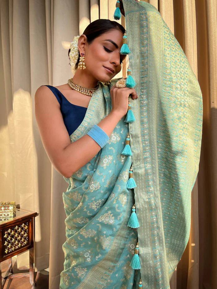 TURQUOISE GREEN SAREE WITH HEAVY BROCADE BLOUSE