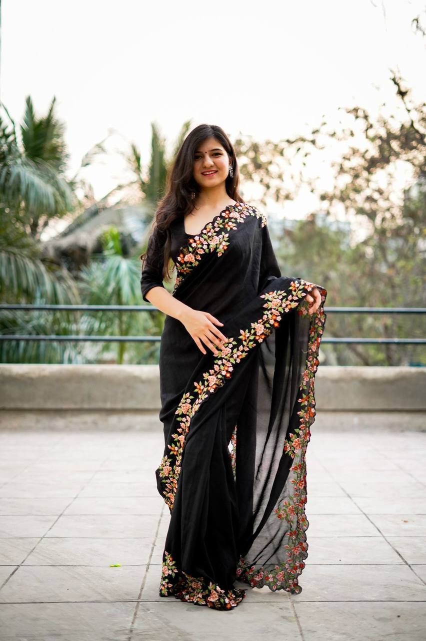 Exquisite Thread and Sequin Embroidery Adorns the C Pallu of this Black Saree