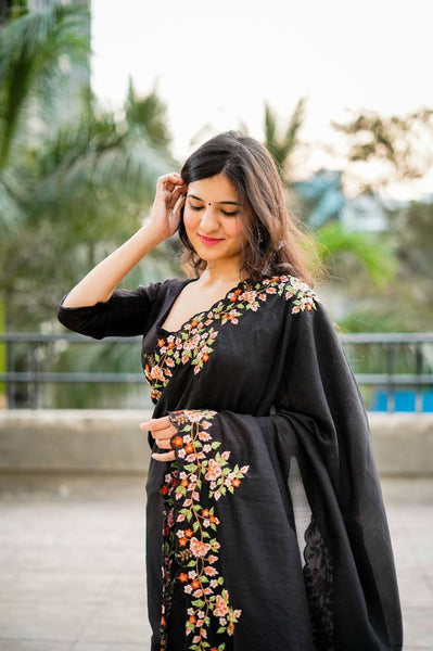 Exquisite Thread and Sequin Embroidery Adorns the C Pallu of this Black Saree