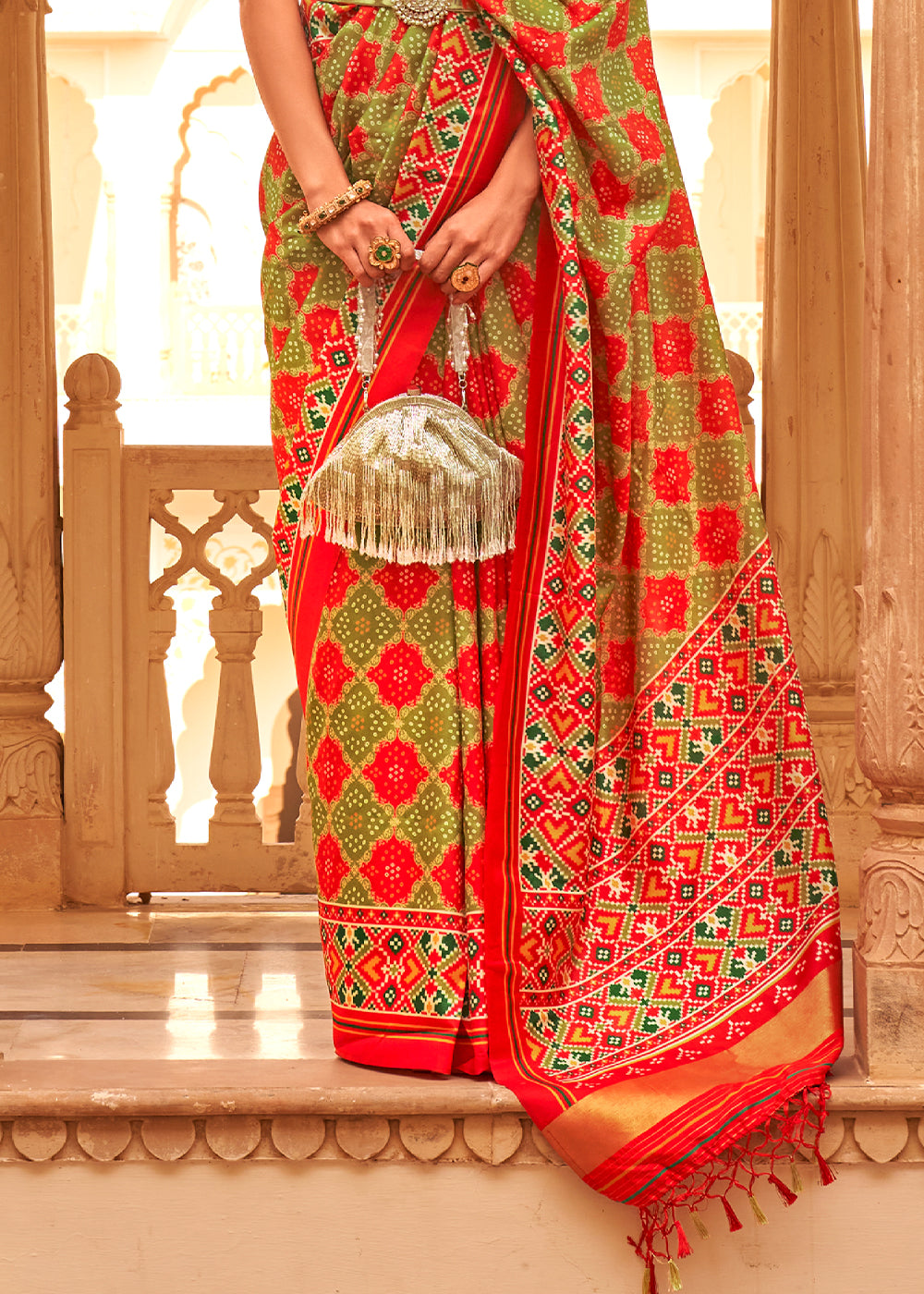 Experience the Fusion of Tradition and Modernity with the Red and Olive Printed Patola Tussar Silk Saree