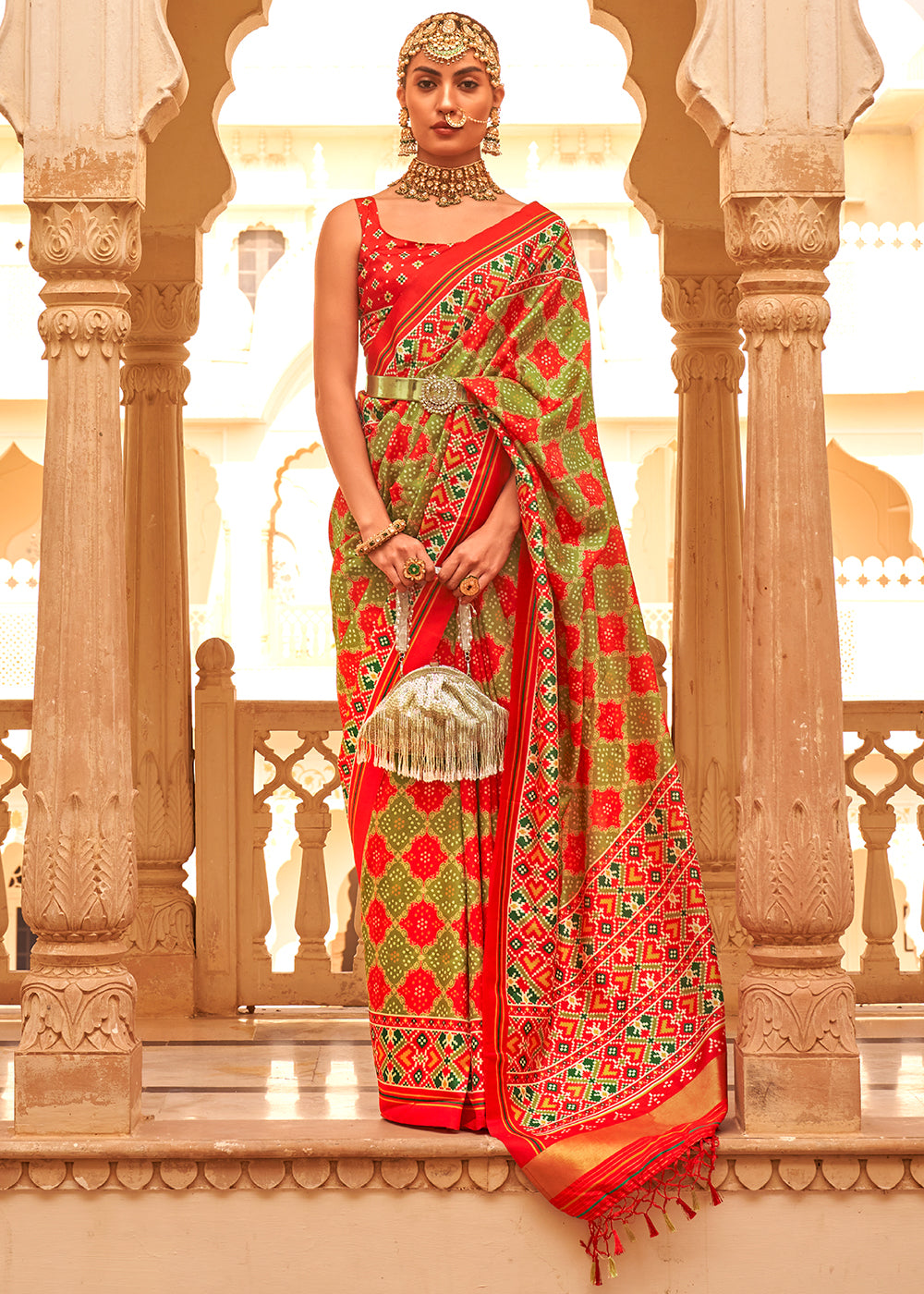 Experience the Fusion of Tradition and Modernity with the Red and Olive Printed Patola Tussar Silk Saree