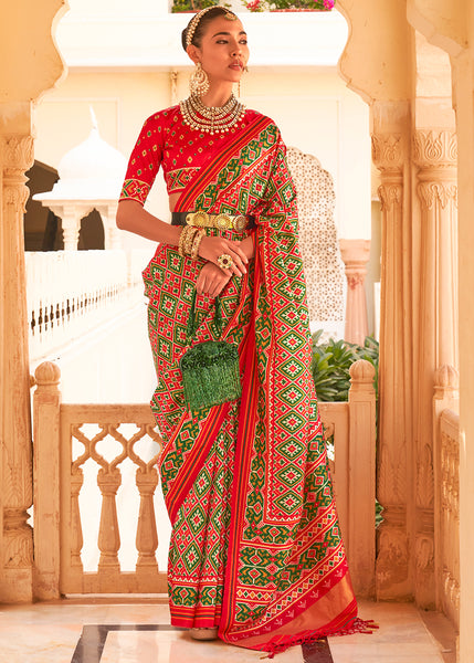 Add a Pop of Color to Your Wardrobe with the Poppy Red and Green Printed Patola Tussar Silk Saree