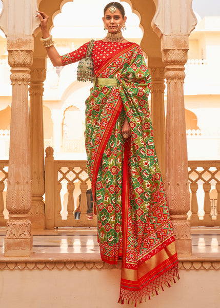 Elegant Festive Green Printed Patola Tussar Silk Saree