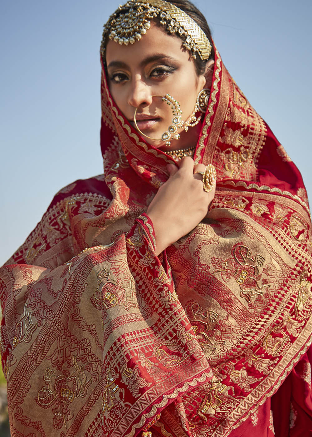 Radiant and Glamorous Red Woven Banarasi Silk Saree with Embroidered Blouse