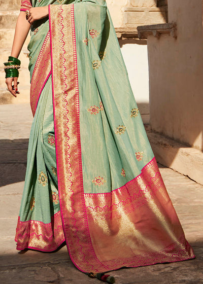 Elegant Light Green Woven Silk Saree with Embroidered Blouse