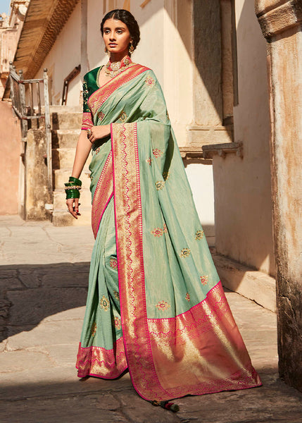 Elegant Light Green Woven Silk Saree with Embroidered Blouse