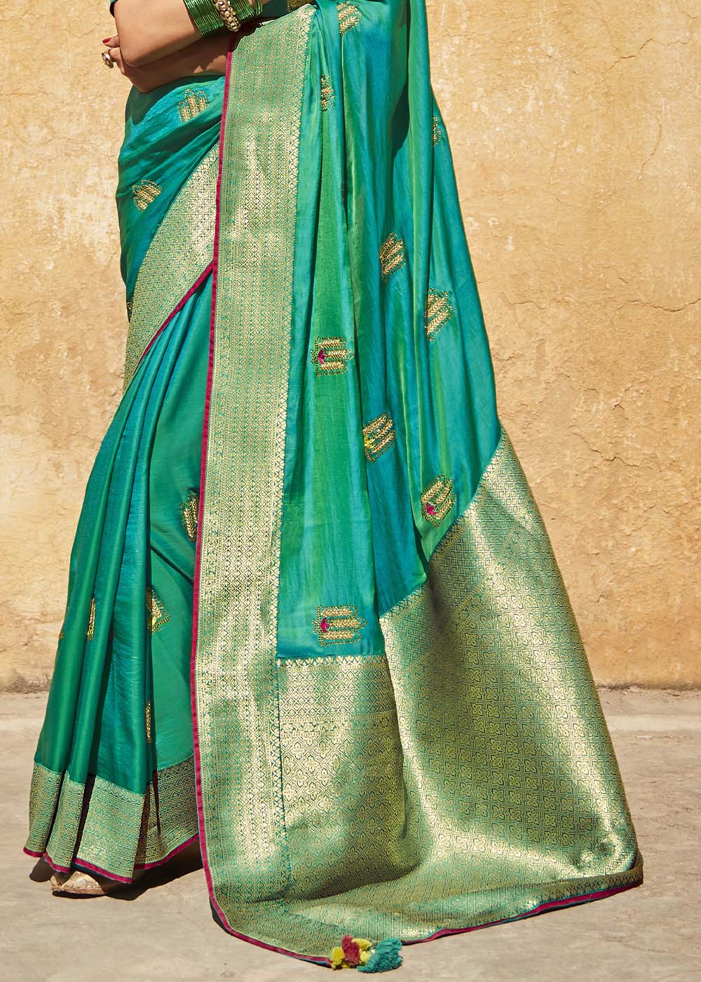 Exquisite Peacock Green Woven Silk Saree with Embroidered Blouse