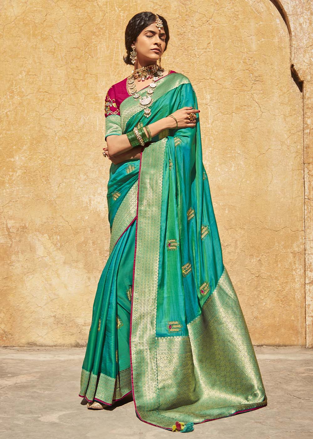 Exquisite Peacock Green Woven Silk Saree with Embroidered Blouse