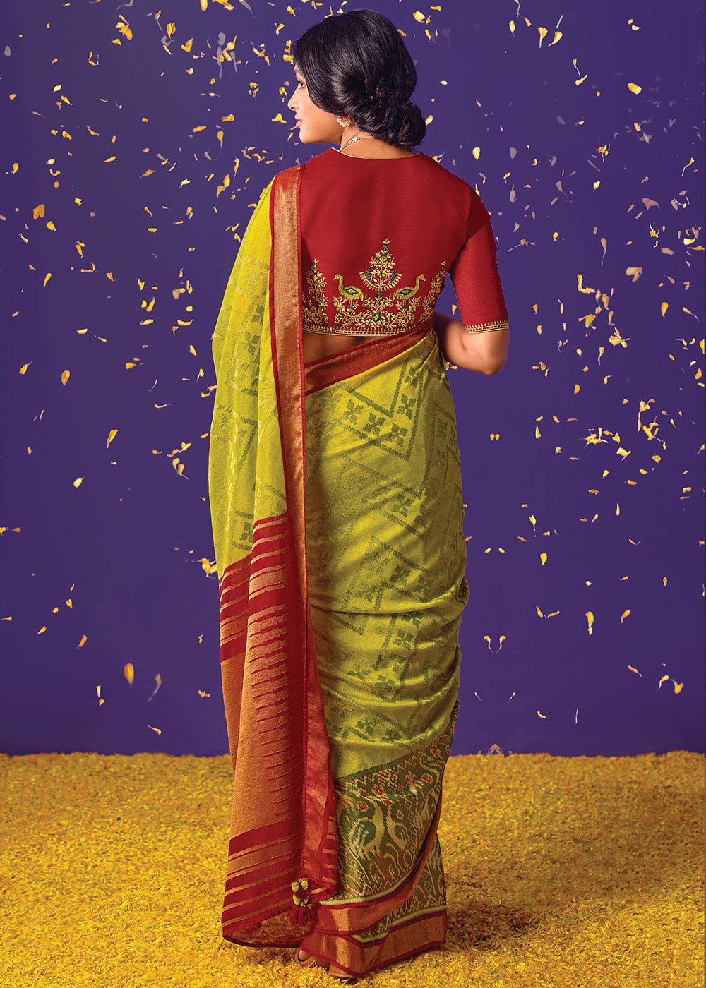 Sheen Green Brasso Saree with Intricate Designs and Zari Border