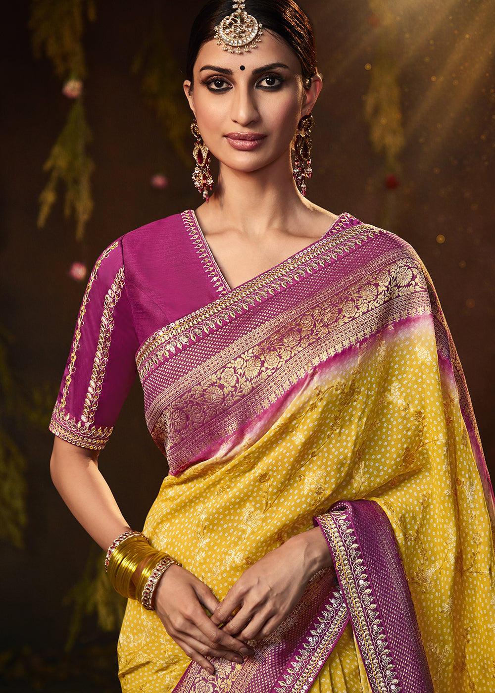 Vibrant Yellow and Pink Georgette Bandhani Saree for a Festive Look