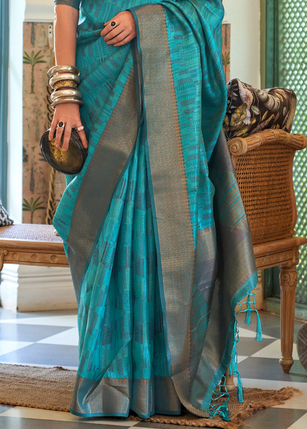 Unleash Your Inner Glamour with the Teal Blue Organza Saree