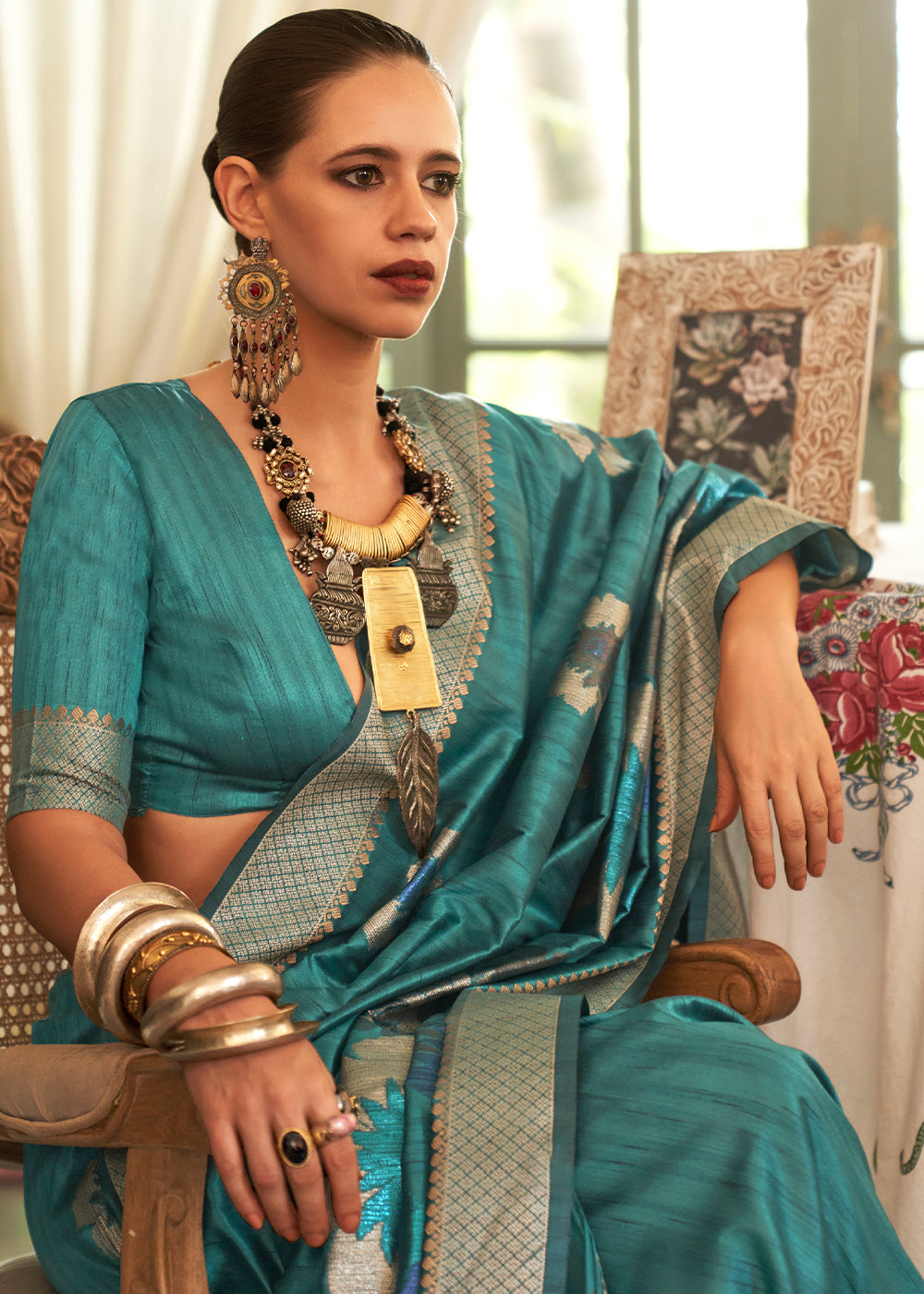 Regal Charm: Handwoven Peacock Blue Banarasi Silk Saree