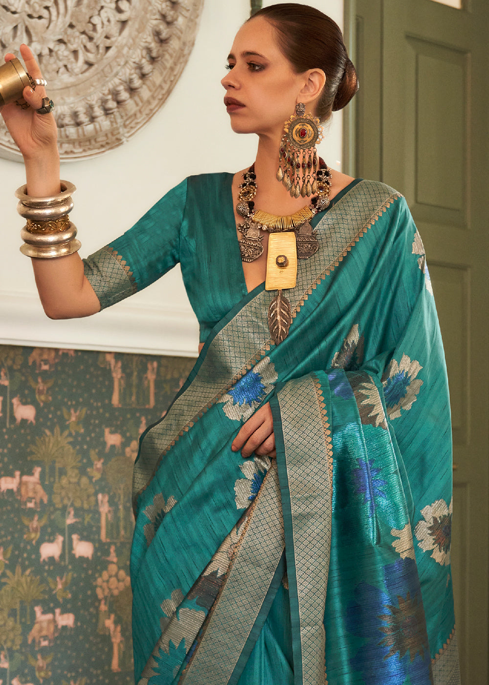 Regal Charm: Handwoven Peacock Blue Banarasi Silk Saree