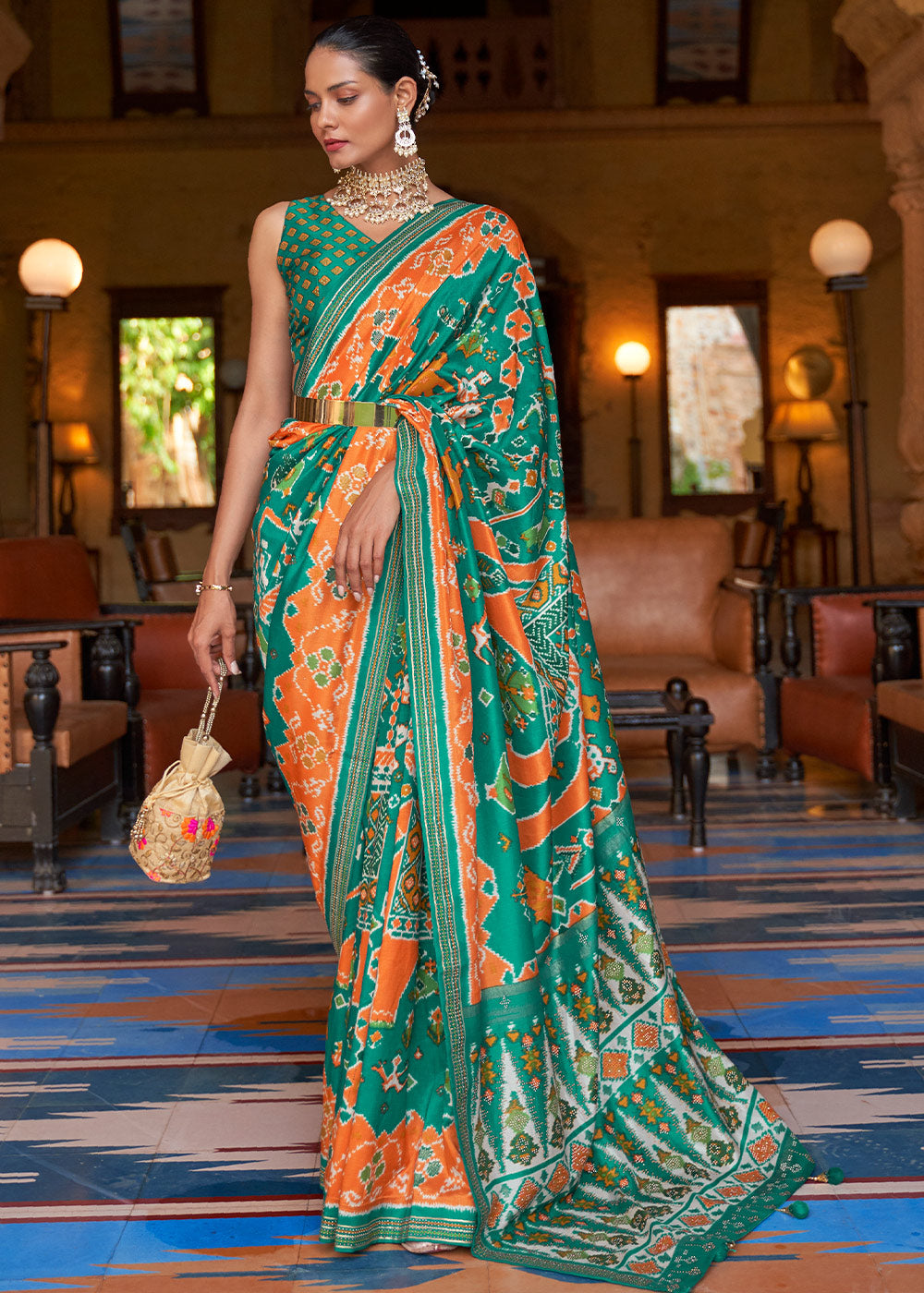 Vibrant Splendor: Green & Orange Printed Patola Silk Saree with Zari Border