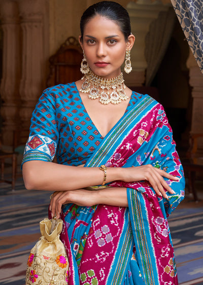 Enchanting Opulence: Blue & Pink Printed Patola Silk Saree with Zari Border