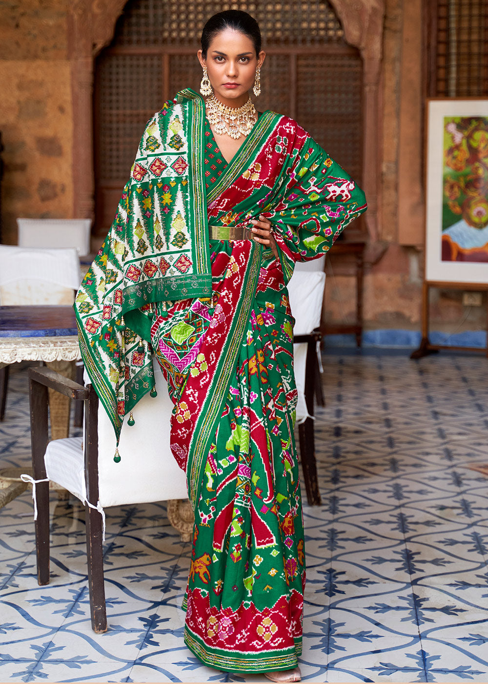 Serenade of the Forest: Green Printed Patola Silk Saree with Zari Border