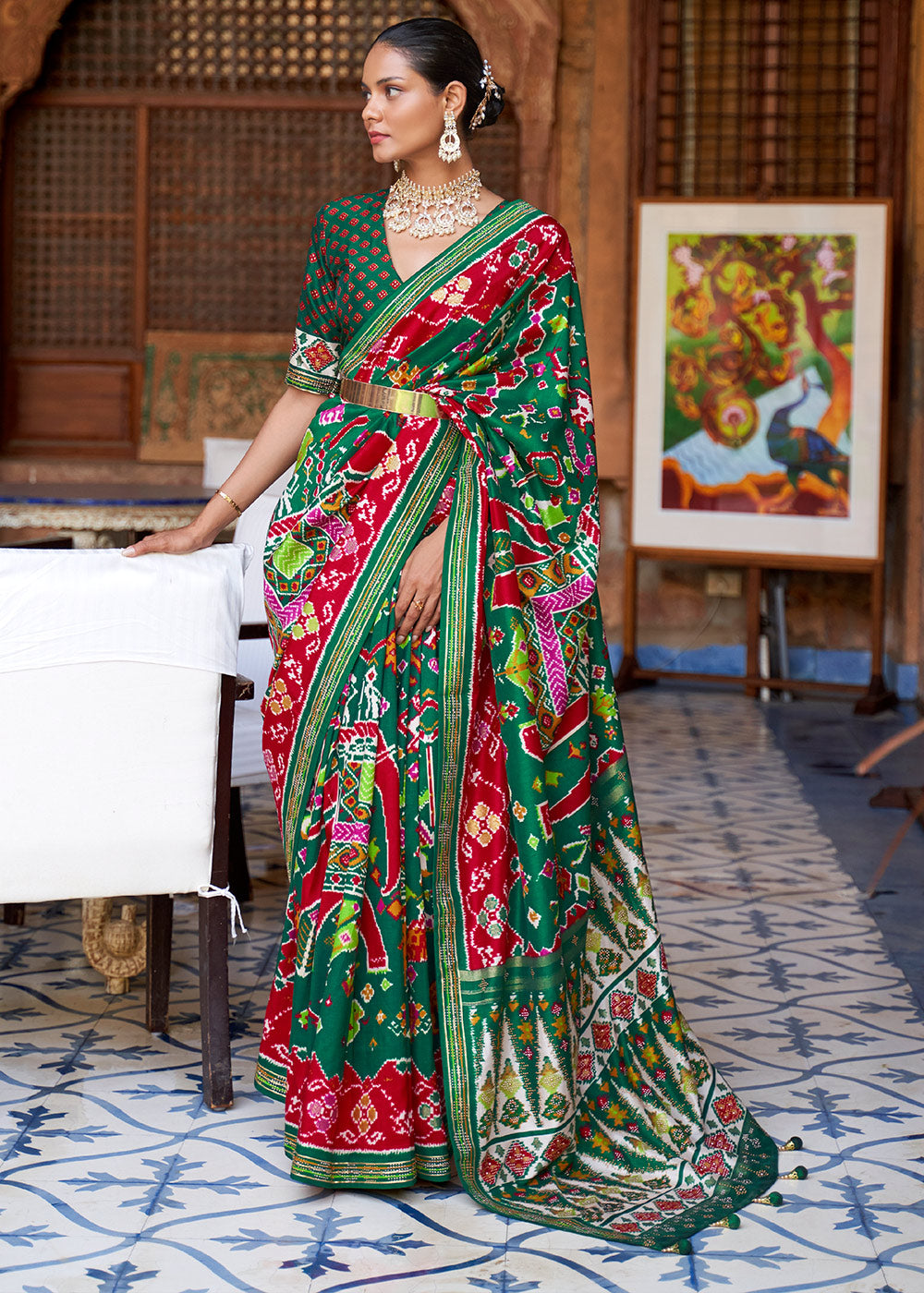 Serenade of the Forest: Green Printed Patola Silk Saree with Zari Border