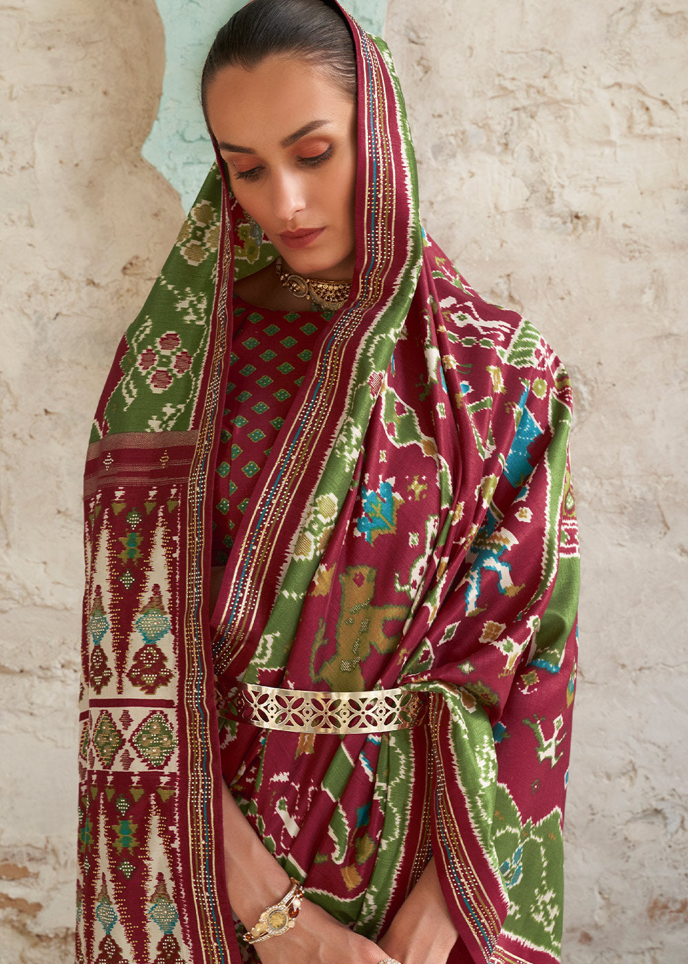 Earthly Elegance: Brown & Green Printed Patola Silk Saree with Zari Border