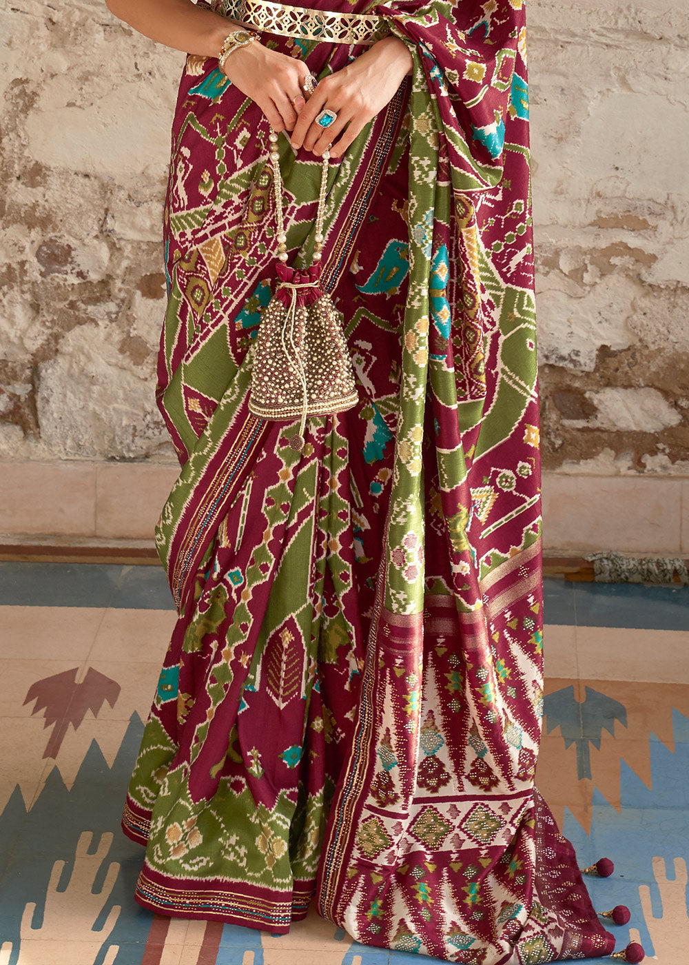 Earthly Elegance: Brown & Green Printed Patola Silk Saree with Zari Border