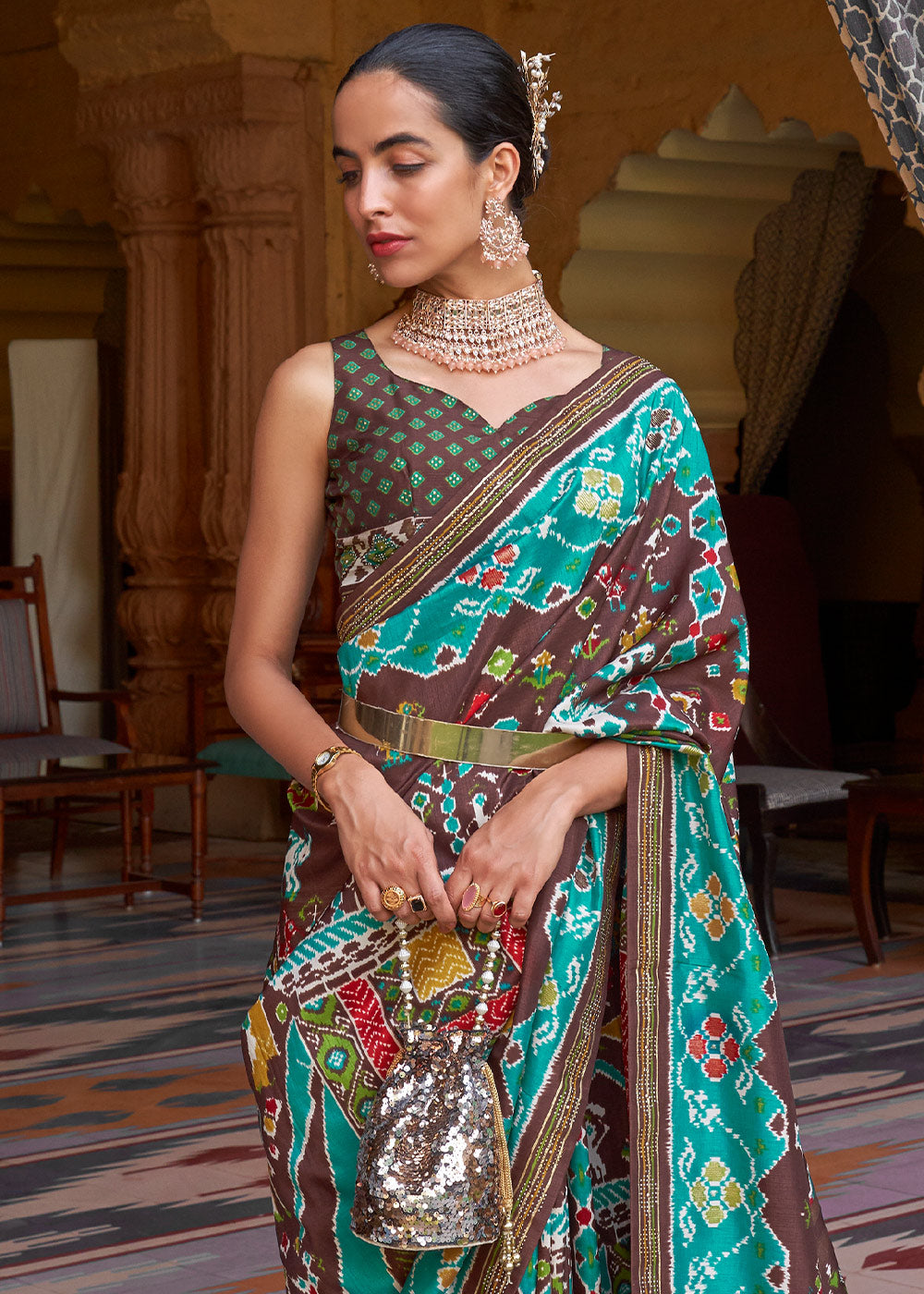 Elegance Personified: Blue & Brown Printed Patola Silk Saree with Zari Border