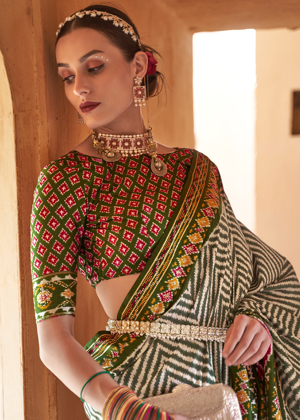 Enchanted Emerald: Shades of Green Printed Patola Silk Saree with Zari Border