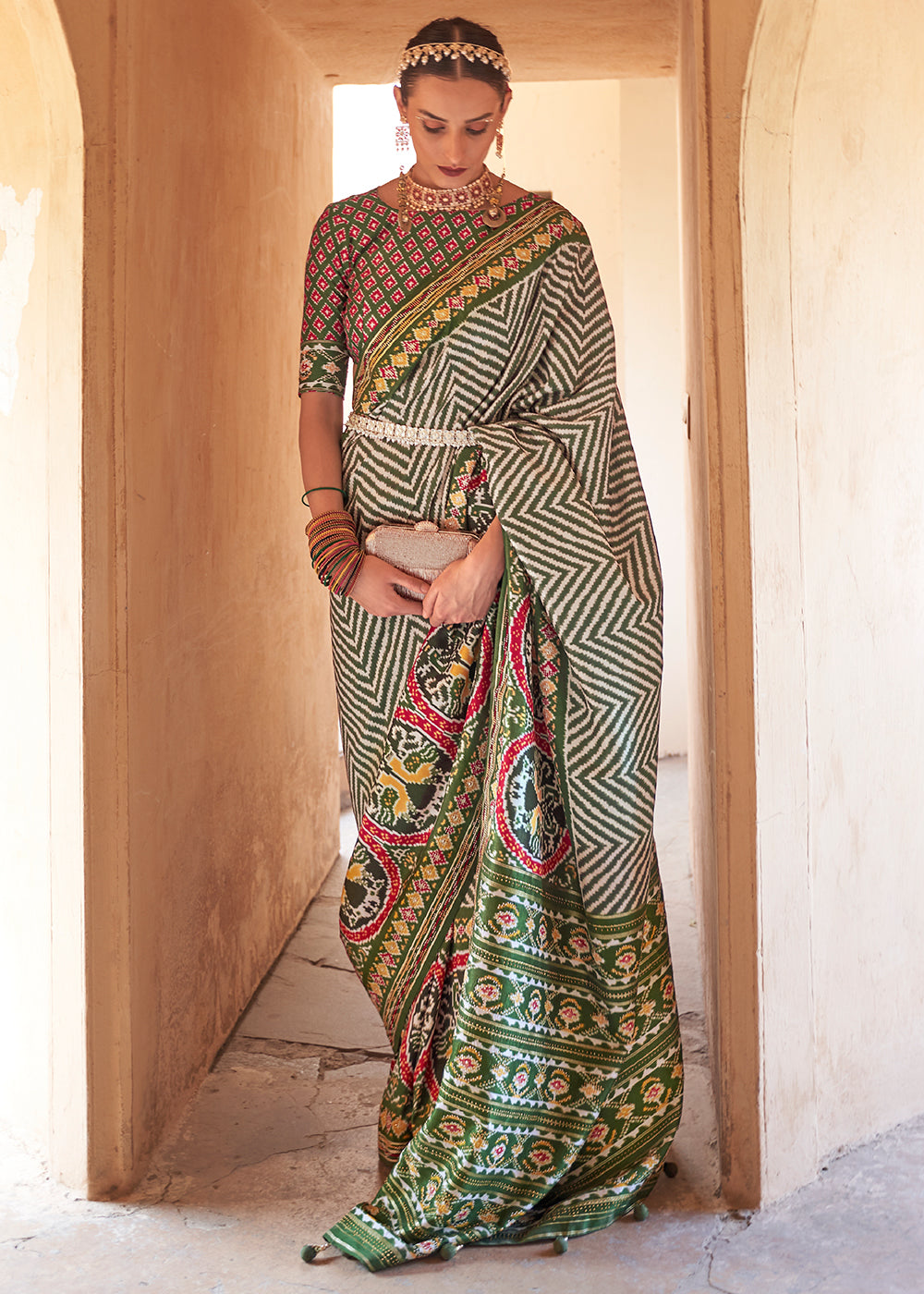 Enchanting Deep Green Off-White Patola Silk Saree