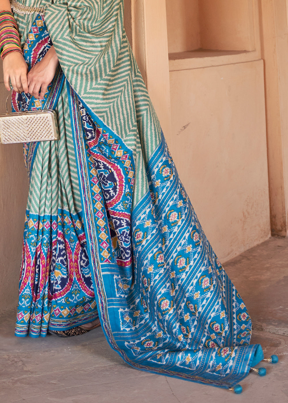 Serenade in Cerulean: Blue Printed Patola Silk Saree with Zari Border