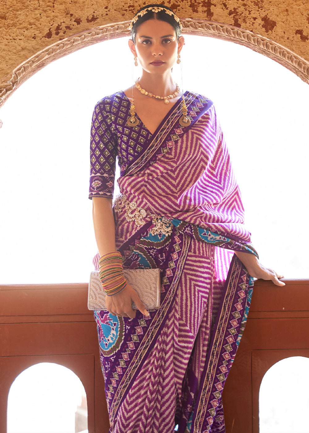 Majestic Melodies: Cerulean Purple Printed Patola Silk Saree with Zari Border