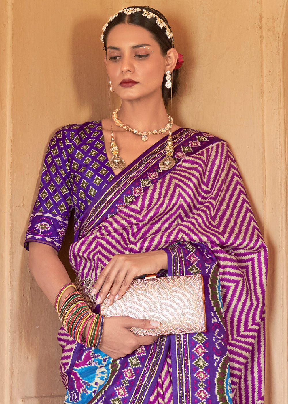 Majestic Melodies: Cerulean Purple Printed Patola Silk Saree with Zari Border