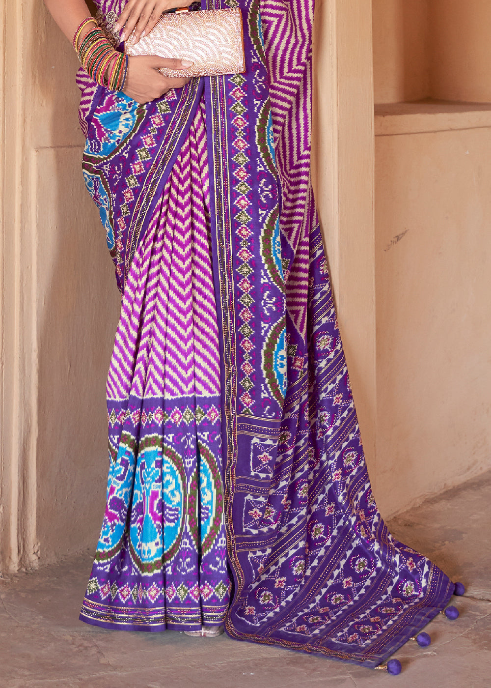 Majestic Melodies: Cerulean Purple Printed Patola Silk Saree with Zari Border