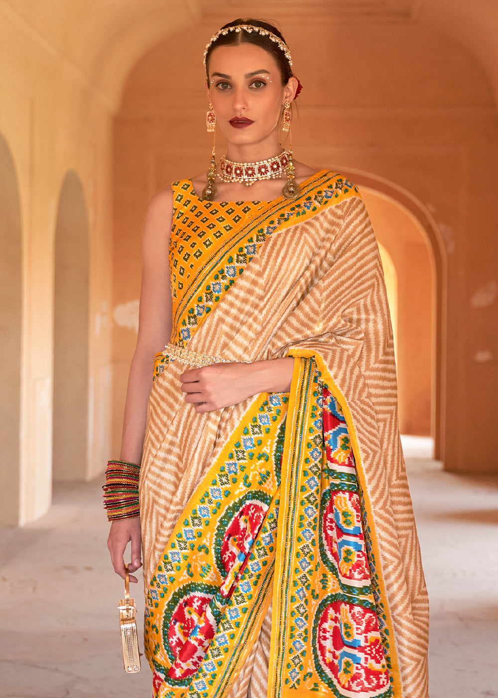 Sunlit Splendor: Yellow Printed Patola Silk Saree with Zari Border"