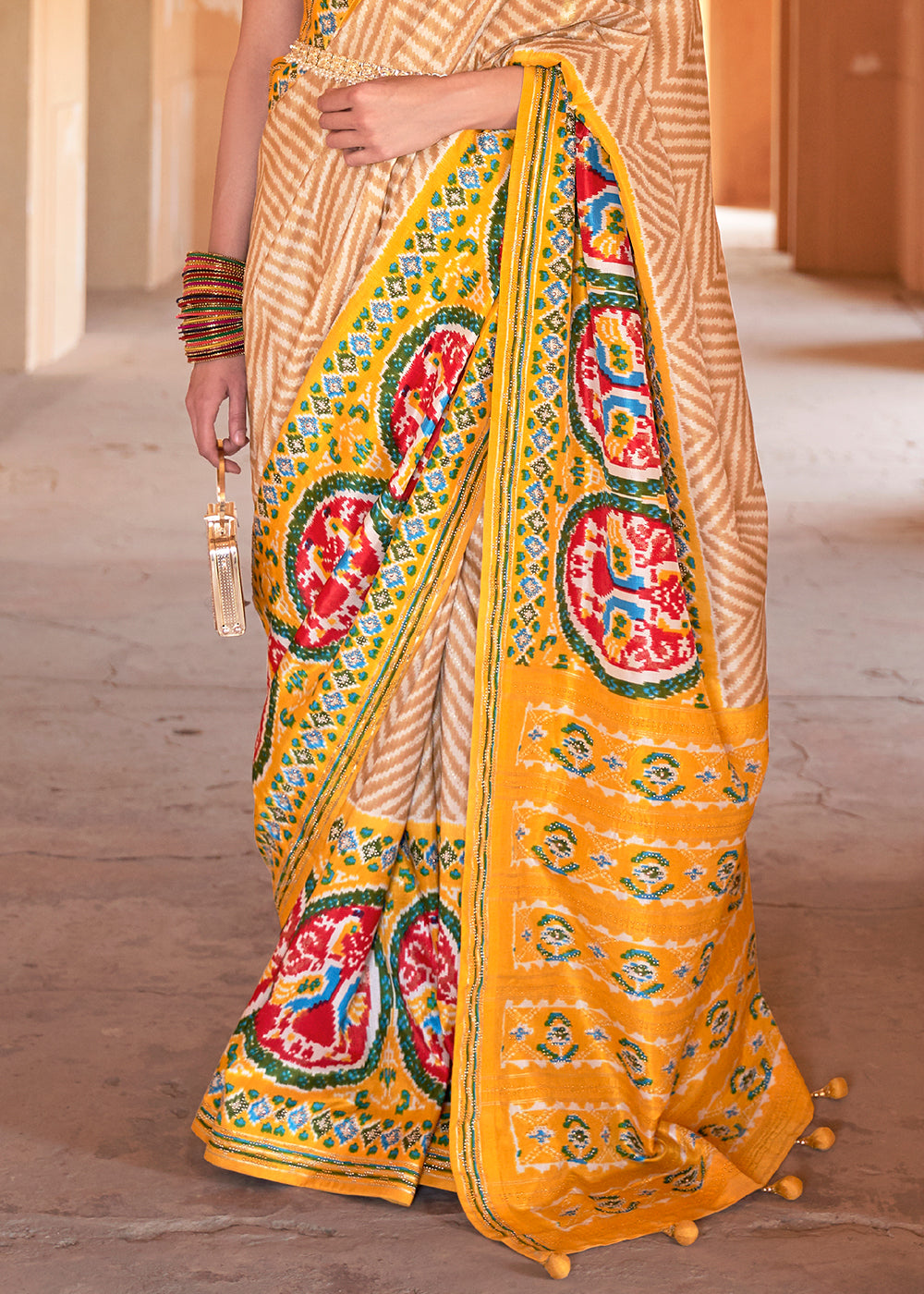 Sunlit Splendor: Yellow Printed Patola Silk Saree with Zari Border"